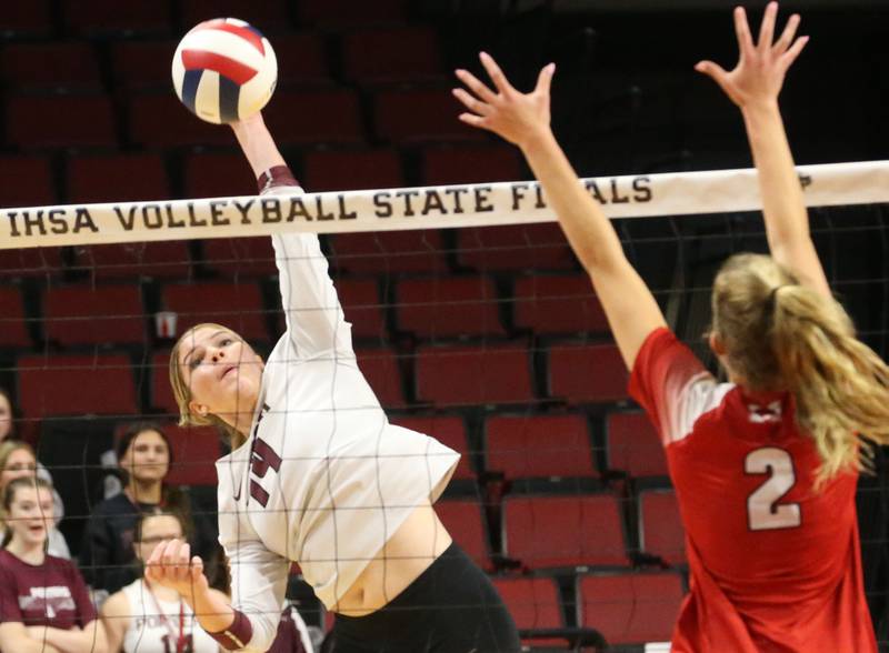 Lockport's Hutsyn Timosciek hits the ball past Marist's Bella Bullington during the Class 4A State semifinal game on Friday, Nov. 15, 2024 at CEFCU Arena in Normal.