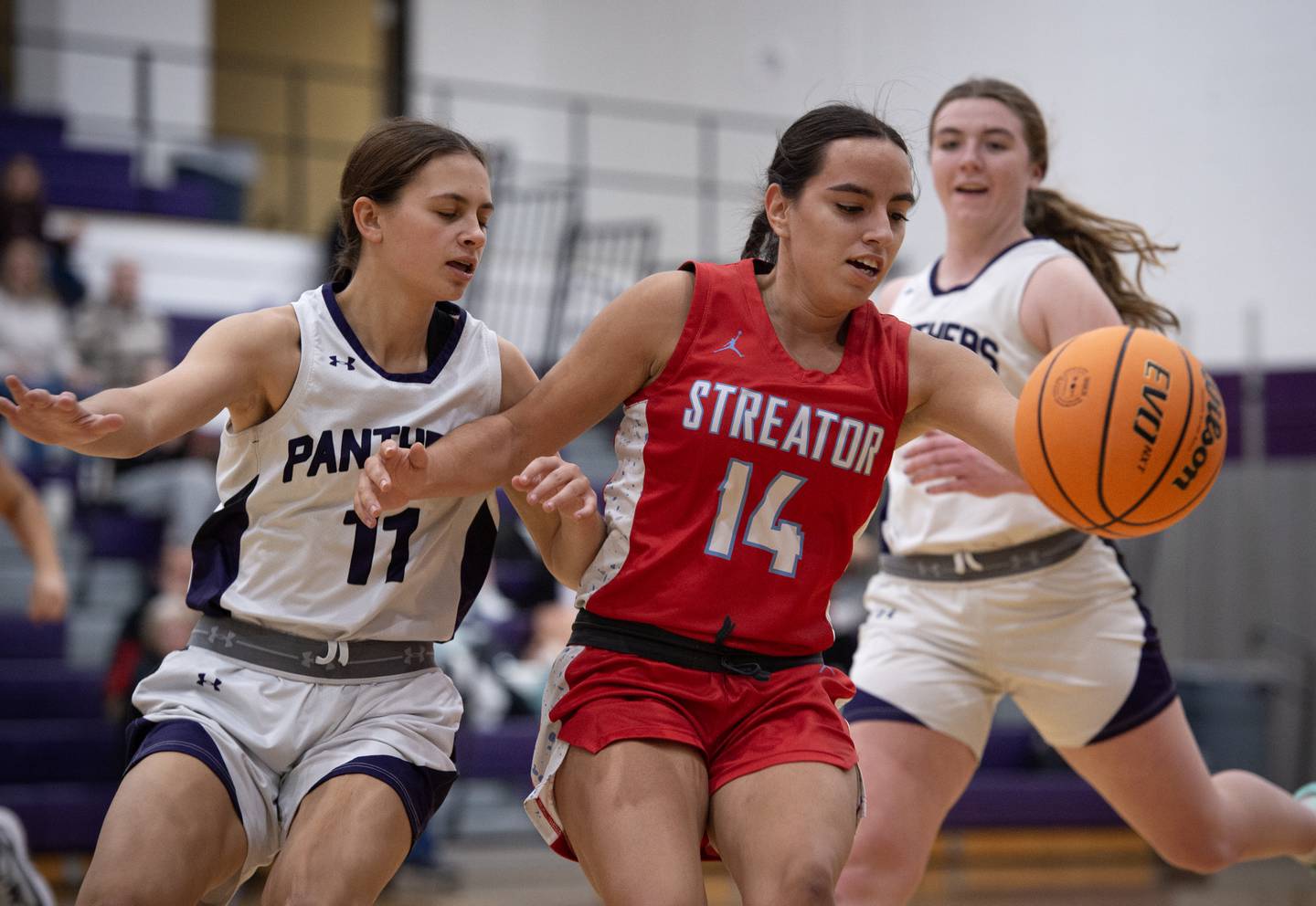 Streator's Isabel Gutierrez controls the ball as Manteno's Peyton Boros guards in a game on Monday, December 8, 2025.