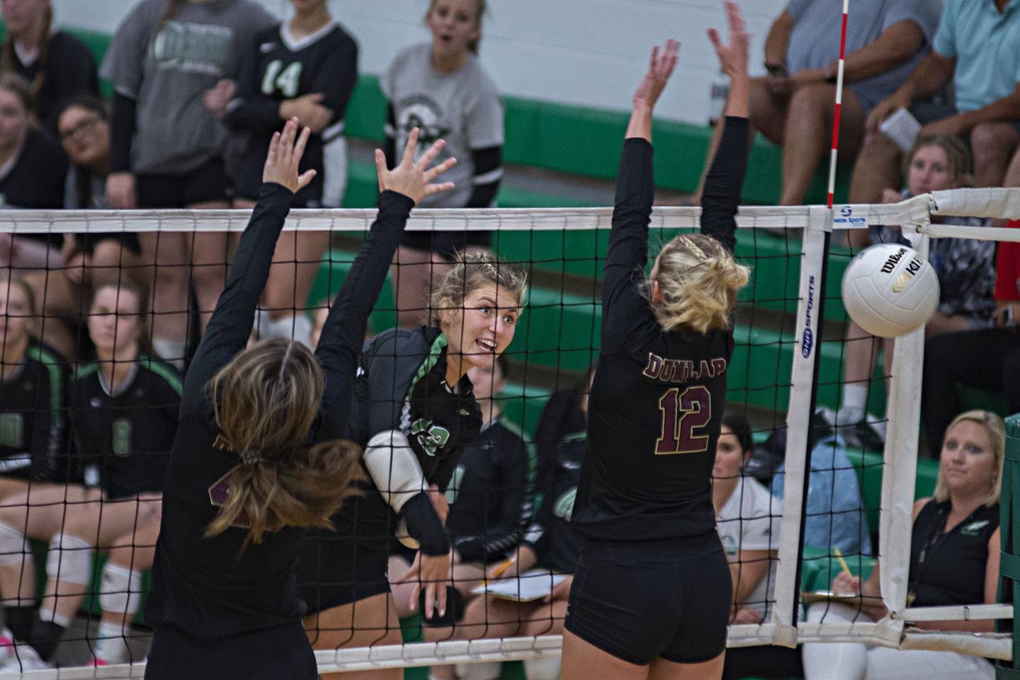 Rock Falls' Claire Bickett hammers a shot against Dunlap Thursday, Aug. 25, 2022.