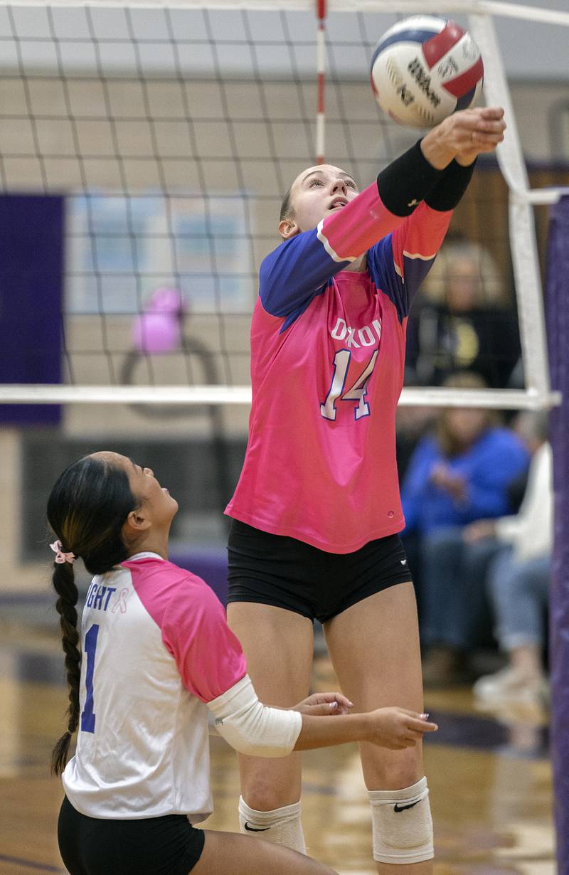 Dixon’s Leah Carlson makes a pass against Genoa-Kingston Thursday, Oct. 17, 2024.