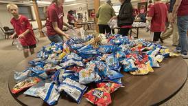 Photos: Mt. Morris church creates care packages for U.S. Navy sailors