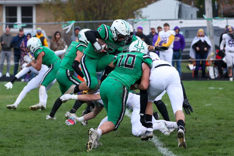 Caiden Nelson of Dwight/Gardner-South Wilmington runs ball into dog pile on Saturday, November 16, 2024 at Dwight High School in Dwight.