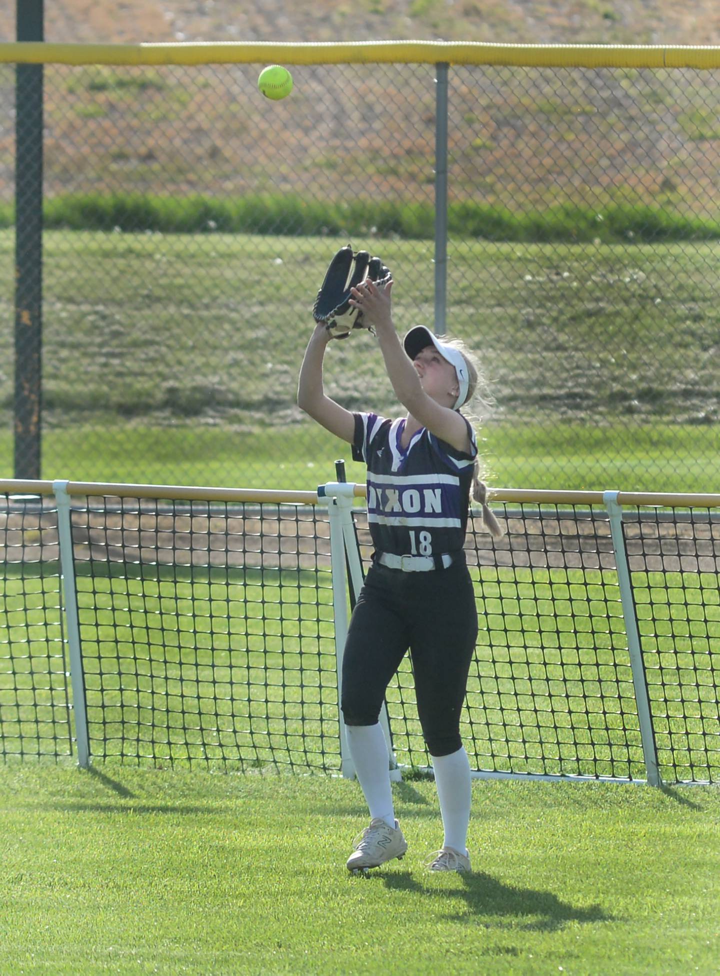 Dixon's Bailey Tegeler camps under a fly ball for an out during Tuesday, May 7, 2025 action at Oregon Park West.