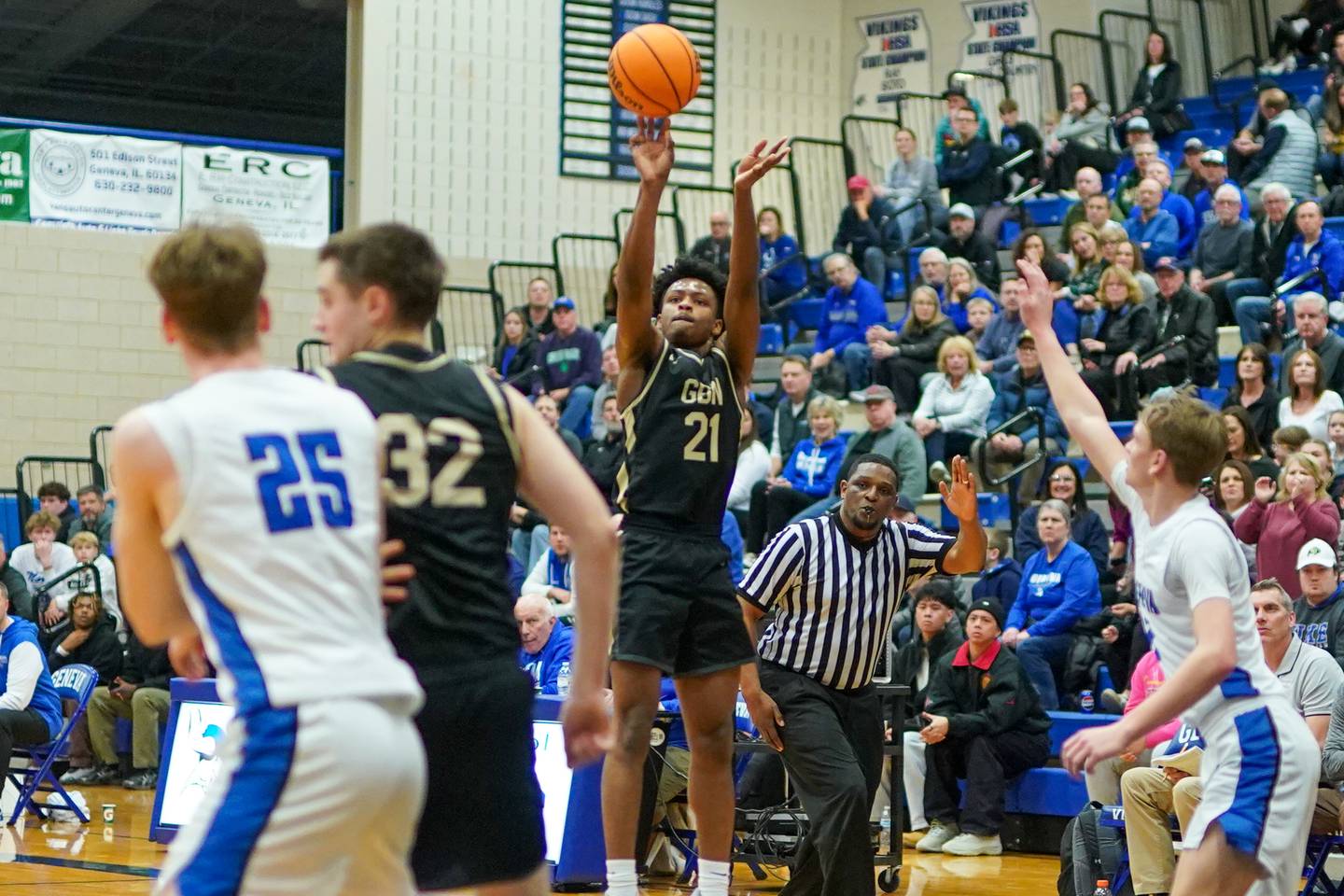 Glenbard North's Maharri Thatch (21) shoots a 3-pointer against Geneva during a class 4A Geneva Regional final basketball game at Geneva High School on Friday, Feb. 28, 2025.