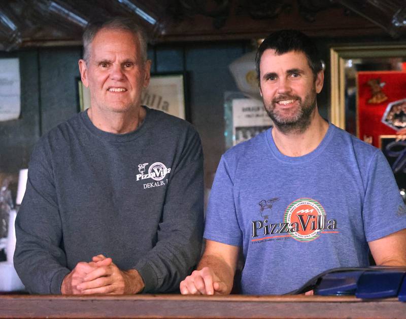 Joe Finn (left) and his son CJ, co-owners of Pizza Villa, behind the bar Monday, Jan. 26, 2026, at the restaurant on Lincoln Highway in DeKalb.