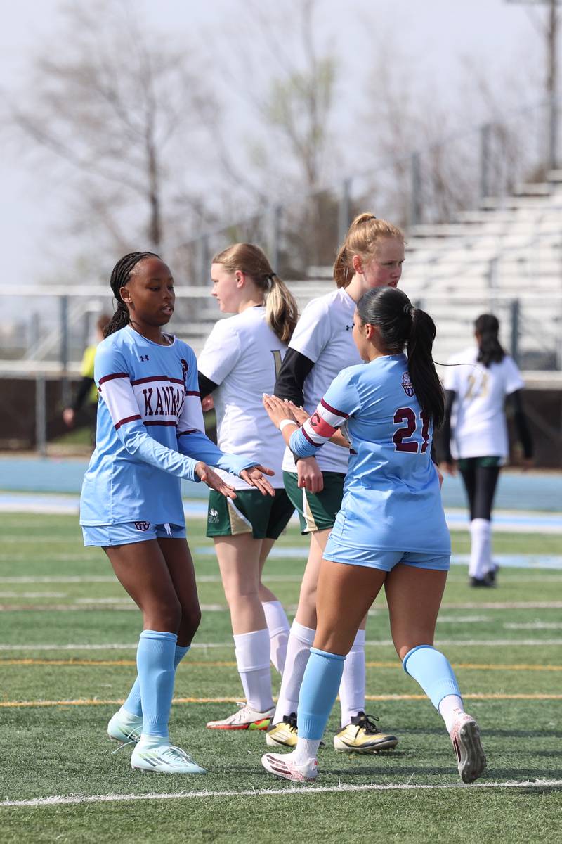 Kankakee's Alina Mkhwanazi, left, congratulates Jocelyn Sanchez on her goal during the Kays' 8-0 victory over Bishop McNamara in the final All-City match on Saturday, April 11, 2026.