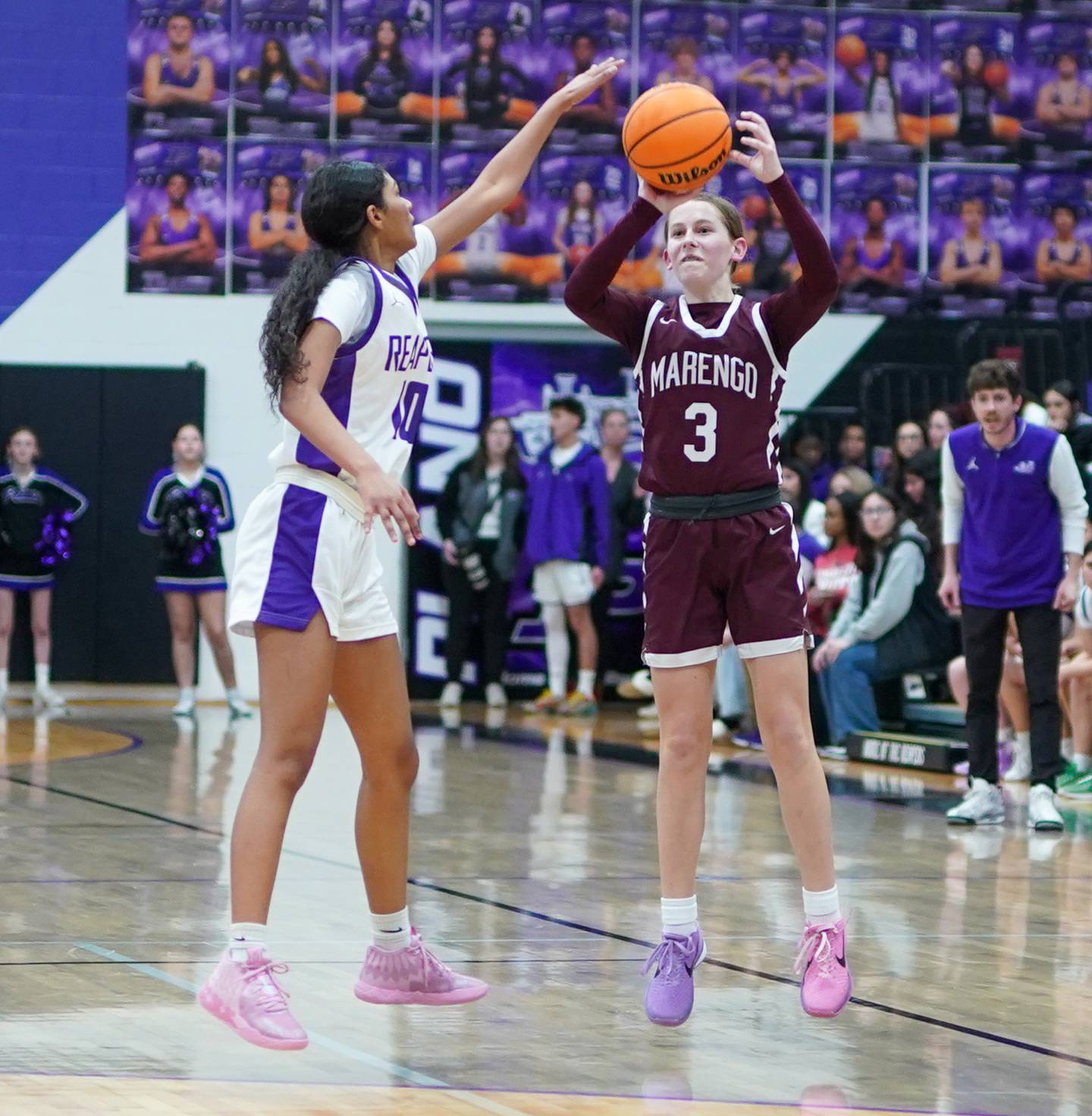 Marengo's Maggie Hanson (3) shoots a three pointer against Plano's Jailyn Brown (10) during a basketball game at Plano High School on Wednesday, January 29, 2025.