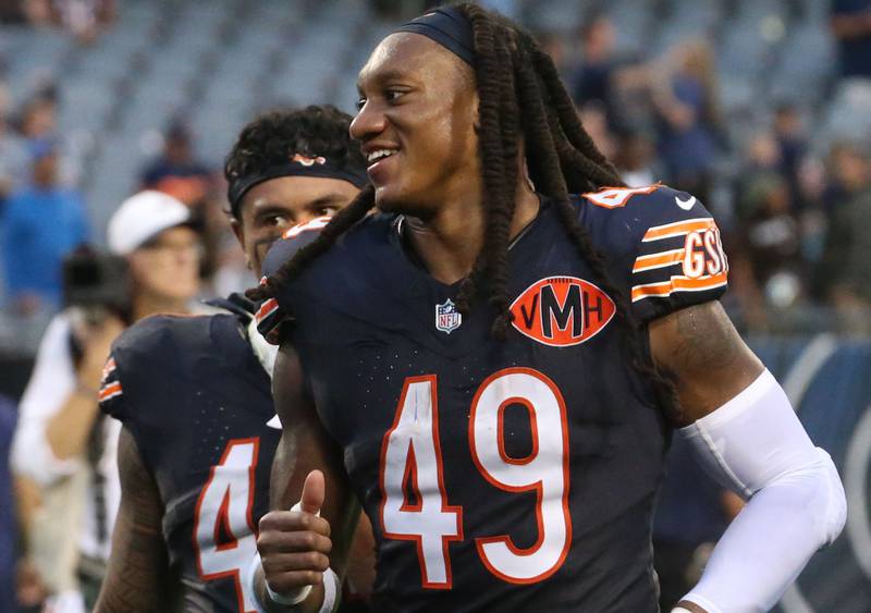Chicago Bears linebacker Tremaine Edmunds smiles while running off of the field on Sunday, Sept. 21, 2025 at Soldier Field.