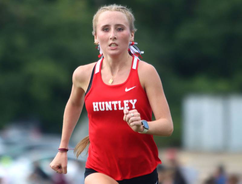 Huntley’s Isabella Ciesla completes the girls varsity race during the McHenry County Cross Country Meet at Emricson park in Woodstock on Saturday, August 30, 2025.