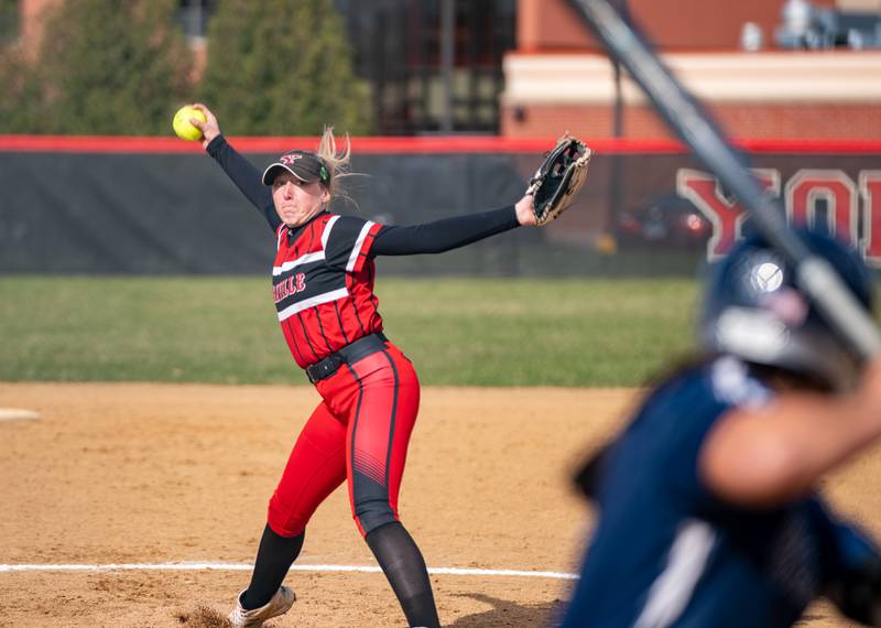 Yorkville's Madi Reeves (2) delivers a pitch against Oswego East during a softball game at Yorkville High School on Tuesday, April 19, 2022.