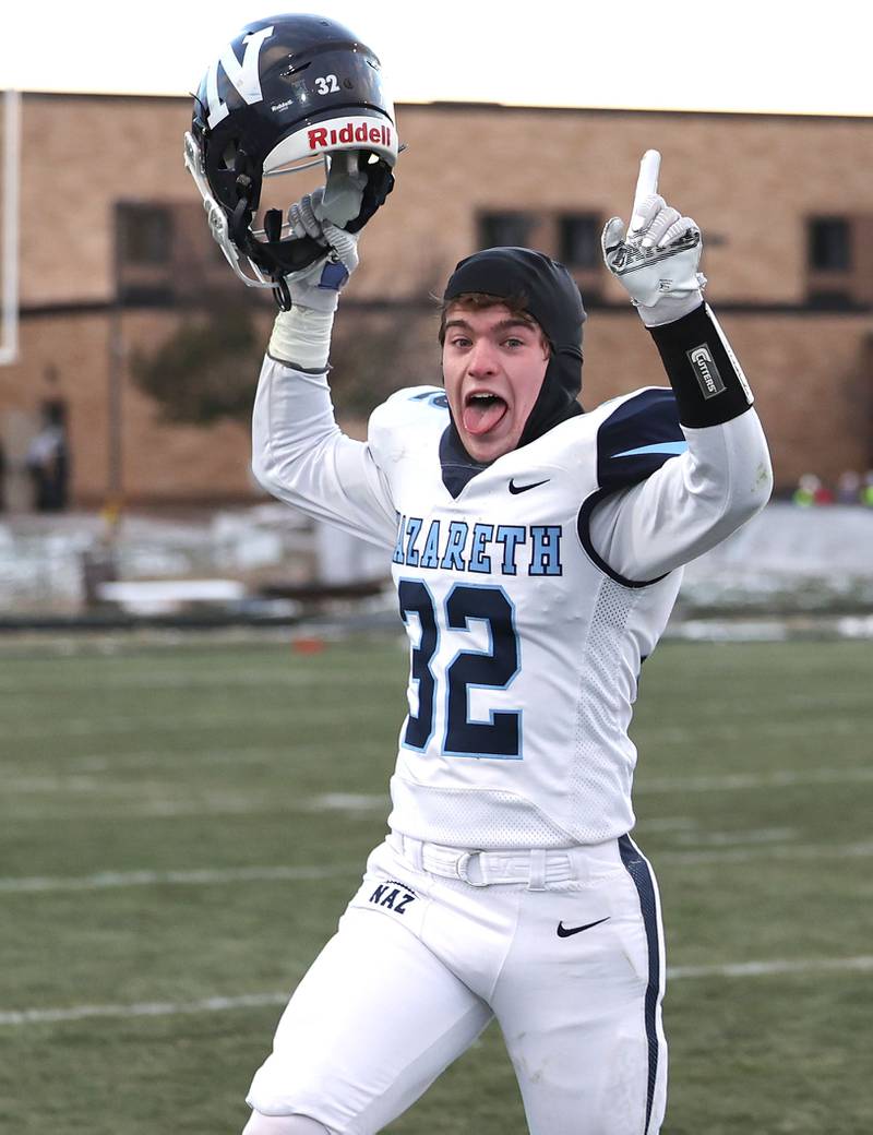 Nazareth's Finn O’Meara celebrates after their win over Sycamore Saturday, Nov. 18, 2022, in the state semifinal game at Sycamore High School.