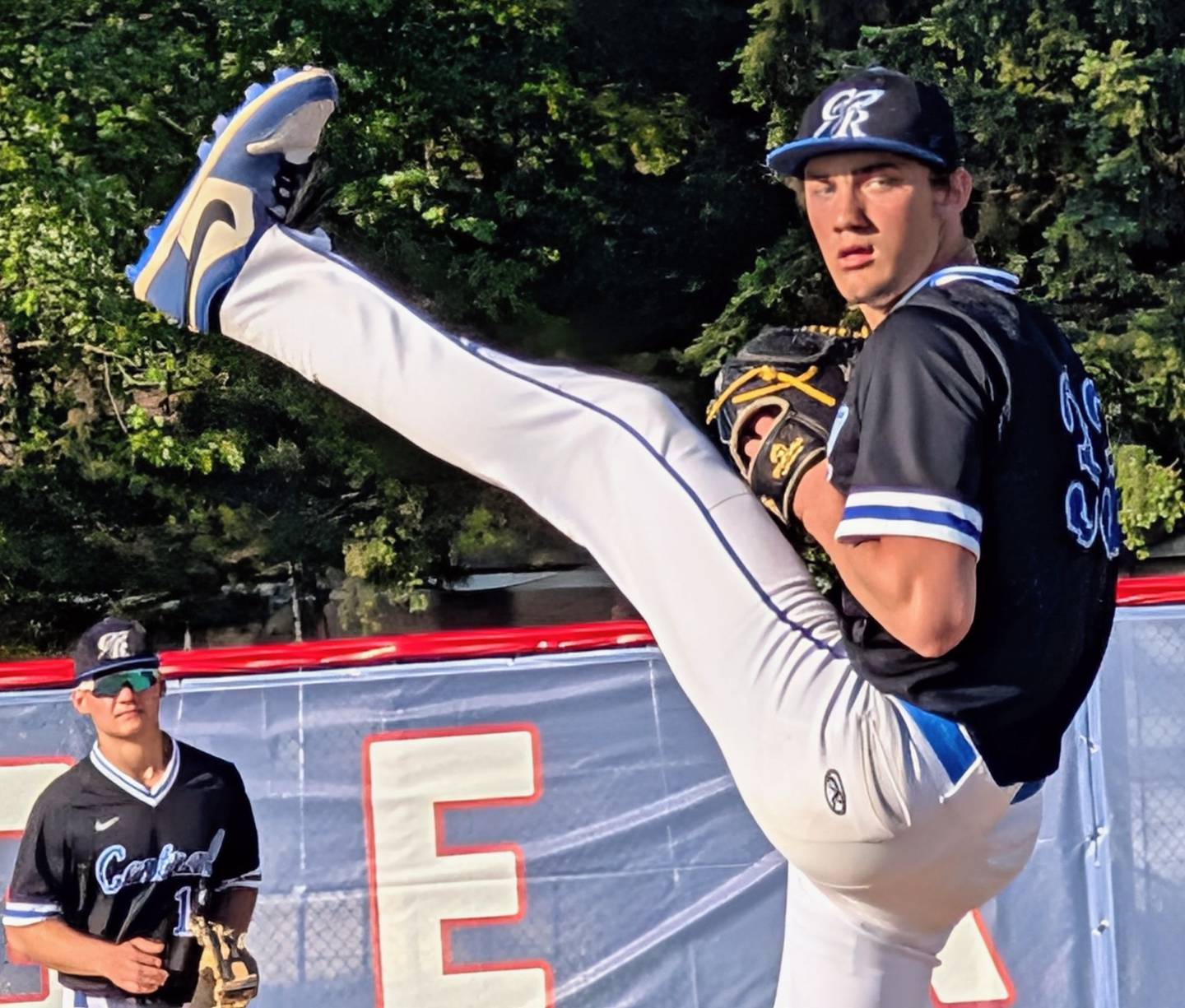 Burlington Central pitcher Aidric Arndt kicks and delivers against Dundee-Crown in the baseball teams' Fox Valley Conference finale Friday, May 15, 2026, in Carpentersville.