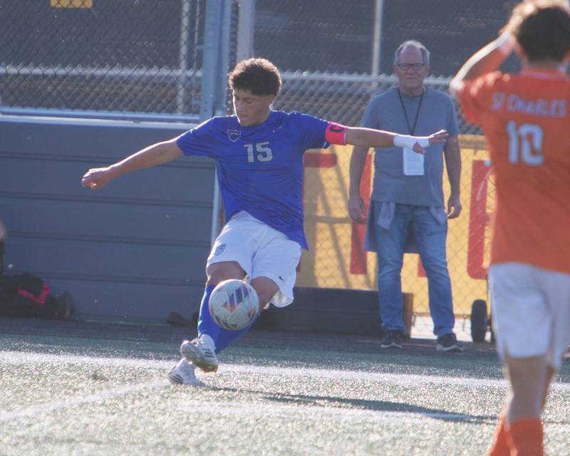 St. Charles North's Wicho DelaPaz kicks the ball down field against St. Charles East on Thursday, Sept. 25, 2025 in Batavia.