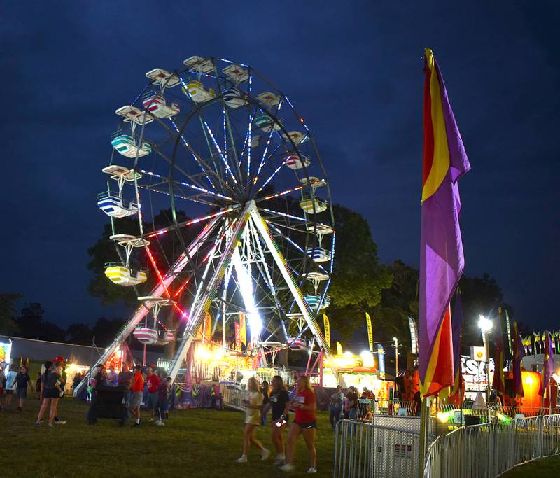 The Ferris wheel provided plenty of color at the Whiteside County Fair on Thursday, Aug. 15, 2024.