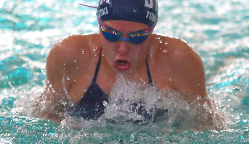 Kaitlyn Tomaszewski of Dundee-Crown co-op swims in the 200-yard medley relay during the Fox Valley Conference Championship Meet at Woodstock North High School on Saturday, Nov. 2, 2024 in Woodstock .