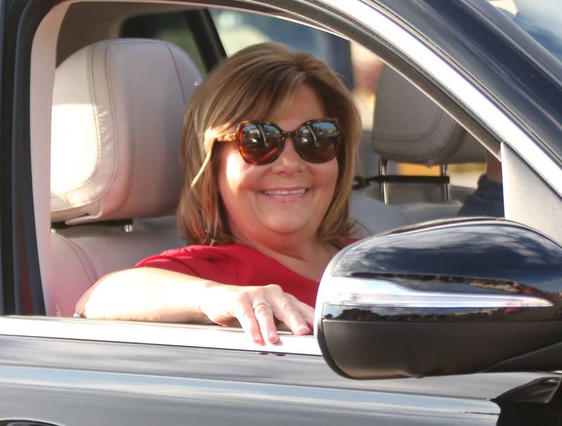 Spring Valley mayor Melanie Malooley Thompson smiles while riding in the Hall High School Homecoming parade on Thursday, Sept. 28, 2023 in Spring Valley.