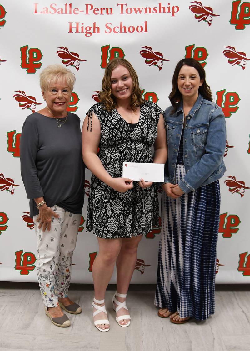 Hope Eldridge (middle) received the L-P Foundation for Educational Enrichment Scholarship. This $1,000 scholarship is awarded to a graduating L-P senior with a minimum cumulative GPA of 3.0, acceptance to a college or trade school and a combination of classroom excellence and extra-curricular activities including 100 hours of community service. The scholarship was presented by L-P Foundation Board Members Jane Riva (left) and Jennifer Radtke.