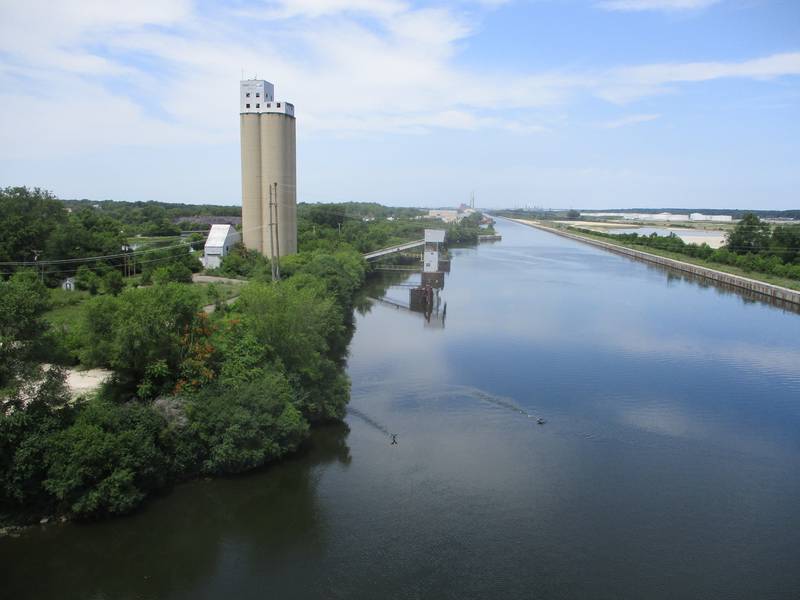 A vacant grain silo along the Chicago Sanitary & Ship Canal and north of the 9th Street bridge in Lockport is one of two silos that will be town down for the Ducere oil terminal project. July 19, 2023.