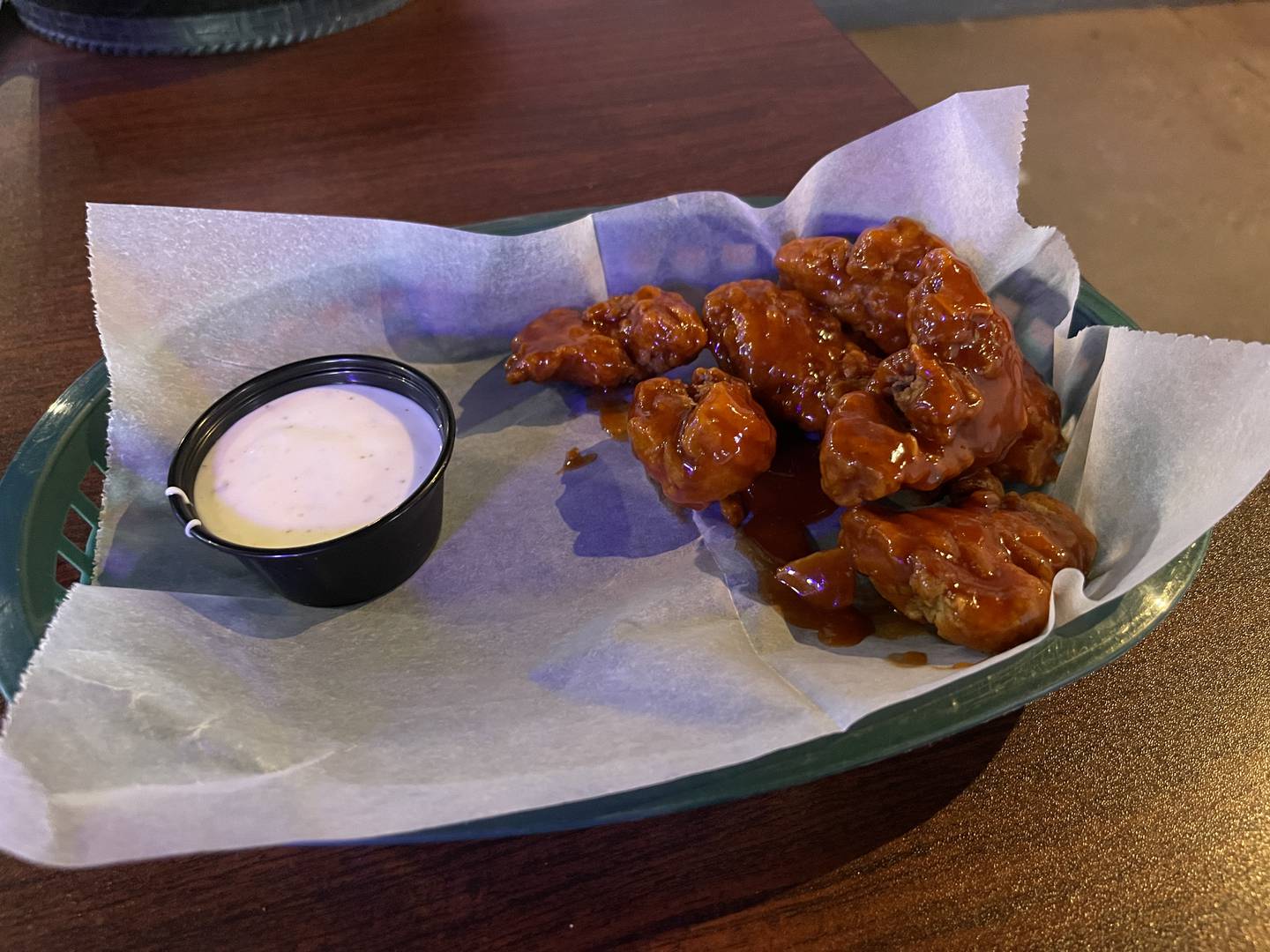 Spicy barbecue wings at Offsides Sports Bar and Grill pair great with ranch, and have some nice heat, but are not too spicy. Offsides is a great place to bring friends, as their menu offers a wide variety and has something for everyone.