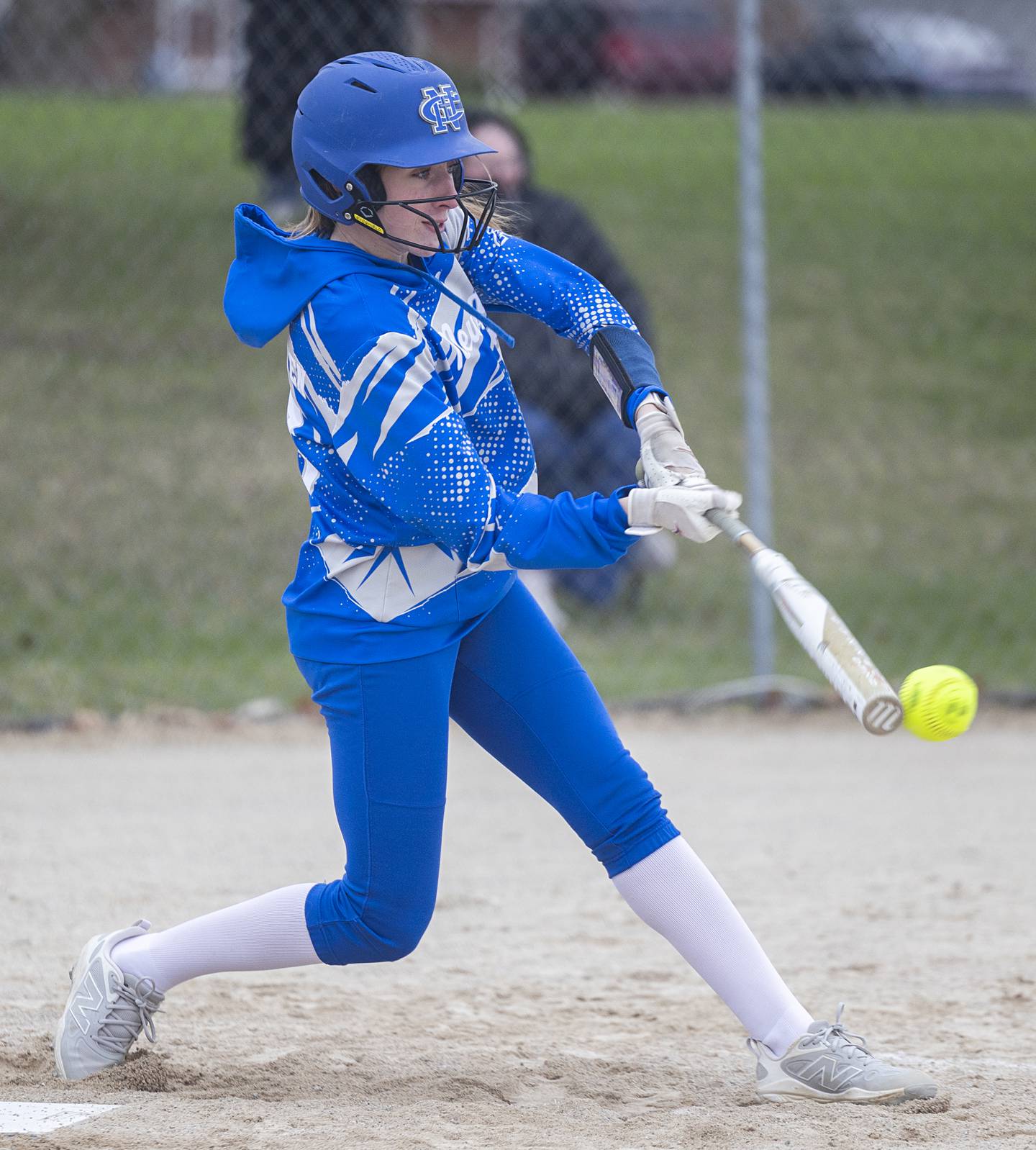 Newman’s Claire Von Holten drives a ball to third against Lena-Winslow Wednesday, April 1, 2026.
