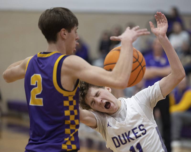 Dixon’s Brody Nicklaus gets caught up in a play against Sherrard Friday, Feb. 20, 2026.