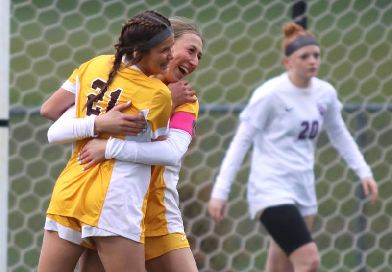Jacobs’ Gabby Wojtarowicz celebrates with teammate Kylie Deegan after a Wojtarowicz goal against Hampshire in varsity girls soccer on Thursday, April 17, 2025, at Jacobs High School in Algonquin.
