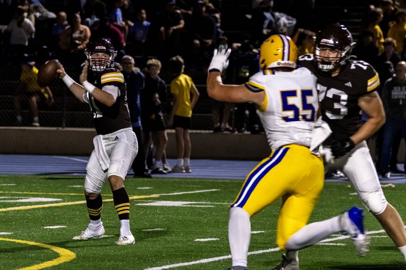 Joliet Catholic's Lucas Simulick looks for an opening during a varsity football game against Lyons Township at Busey Bank Field at Joliet Memorial Stadium on Aug. 29, 2025.