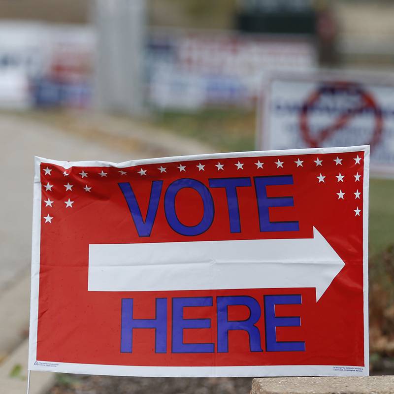 A sign directs voters to the right location at the McHenry Township Government Complex, 3703 N. Richmond Road in Johnsburg, on Friday, Nov. 4, 2022. The polls will be open on Election Day from 6 a.m. to 7 p.m.