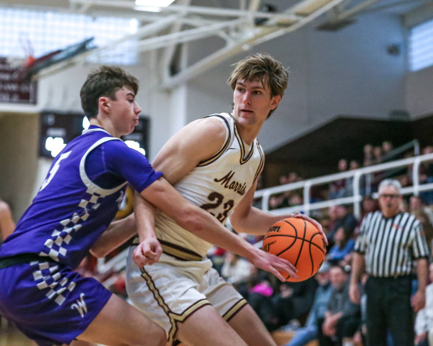 Morris's Jack Wheeler (23) backs down Wilmington's Declan Moran (5) during their basketball game between Wilmington at Morris. Saturday Jan 4, 2025 in Morris.