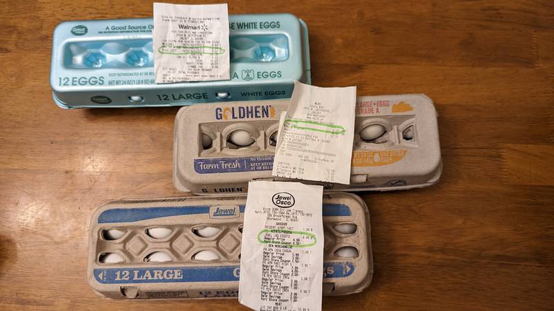 Three cartons of large eggs from three chain grocery store in the Joliet area sit on the kitchen table of the home of Denise M. Baran-Unland, Herald-News features editor. All were purchased on Tuesday, Jan. 17, 2023, show varying prices in the $4 range.