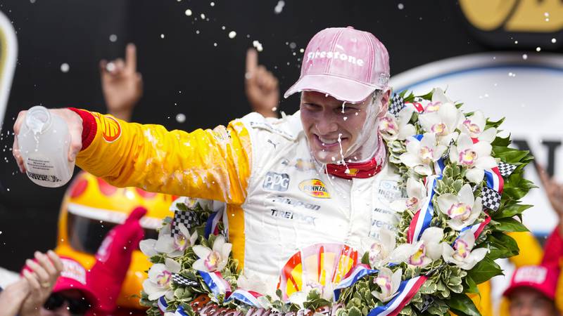 Josef Newgarden celebrates after winning the Indianapolis, Sunday, May 28, 2023, at Indianapolis Motor Speedway.