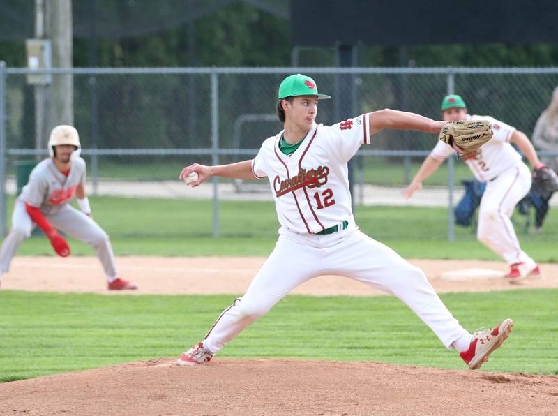 L-P's Brendan Boudreau delivers a pitch while Ottawa's Julian Alexander leads off first base on Monday, April 24, 2023 at Dickinson Field in Oglesby.