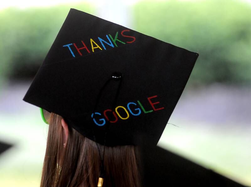 Sarah Liethen,who graduated with high honors, gives thanks to Google on her cap Thursday, May 12, 2022, during the Haber Oaks Campus graduation in the courtyard of Crystal Lake South High School.