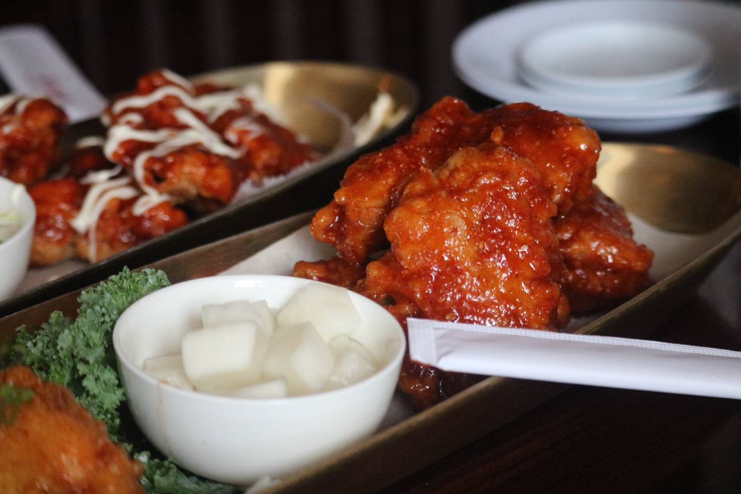 Korean fried chicken from Omi Sushi in DeKalb comes in a variety of flavors, including plain, magic sprinkle, soy garlic, sweet and mild, and supreme or hot. Omi Sushi in DeKalb is pictured March 13, 2023.