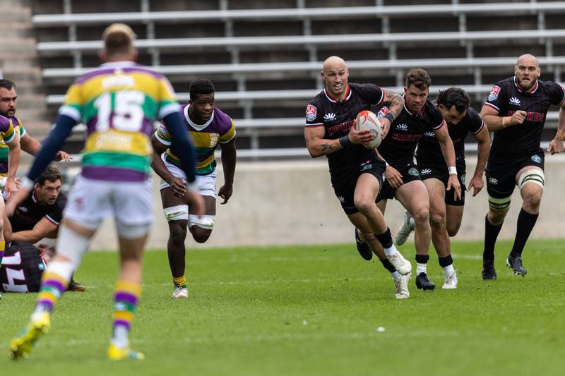 Chicago Hounds' inside center William Meakes, breaks through the NOLA Gold line during an MLR match at Seat Geek Stadium in Bridgeview, on Sunday April 23, 2023.