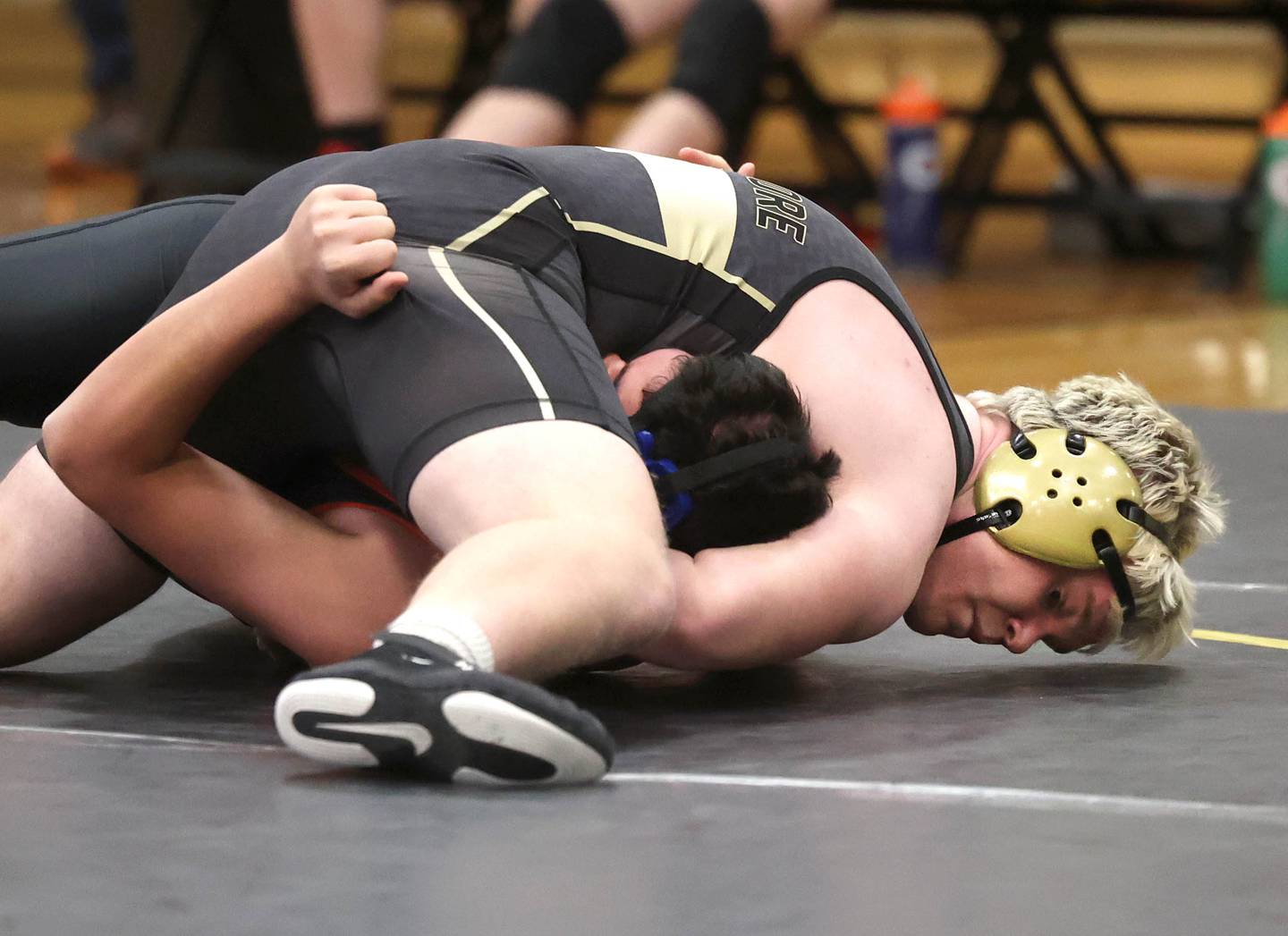 Sycamore’s Adam Carrick pins Kaneland’s George Slepicka during their 190 pound match Thursday, Jan. 9, 2025, at Sycamore High School.