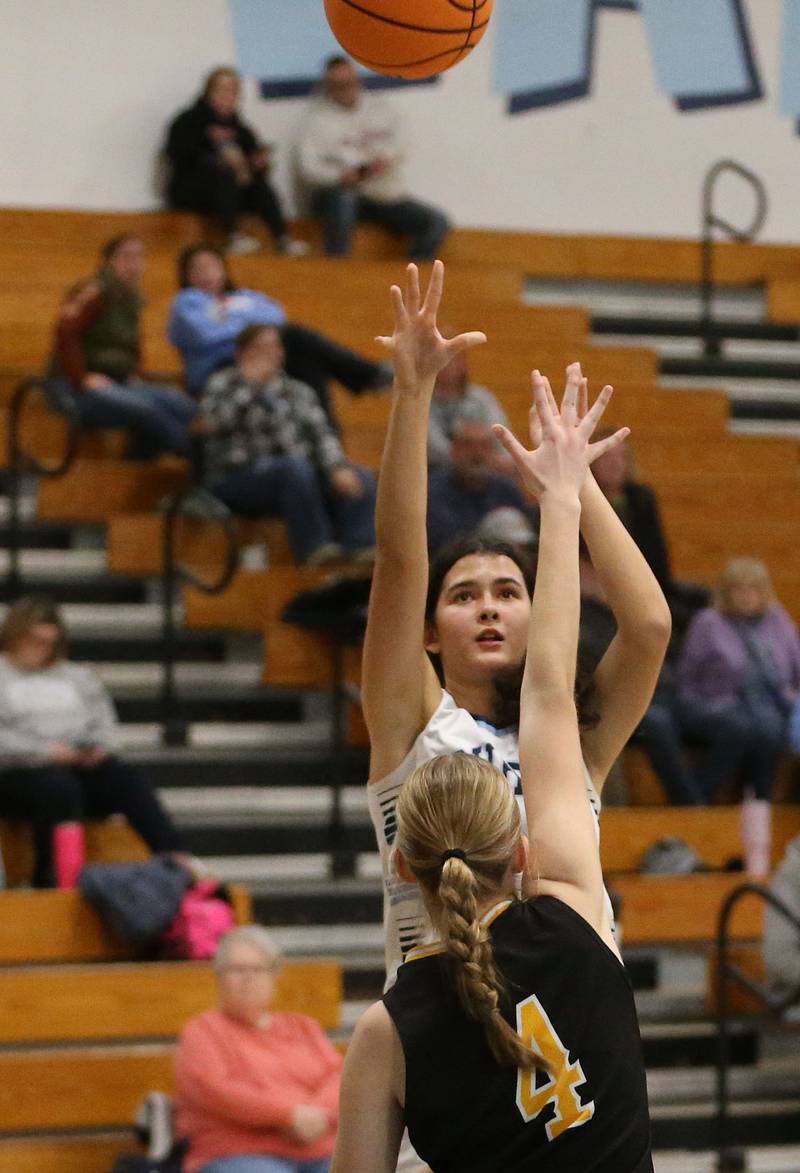 Bureau Valley's Bella Birkey lets go of a shot over Riverdale's Finley Brock during the Thanksgiving Tournament on Wednesday, Nov. 20, 2024 at Bureau Valley High School.