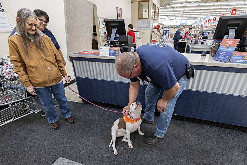 Official Sterling Farm and Fleet mascot Sugar gets some attention from manager Dan Heslop Thursday, Nov. 9, 2023 at the store. Blain’s Farm and Fleet is celebrating 65 years in Sterling.
