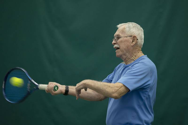 Bob Orta practices his tennis with Westwood Tennis Pro Chris Dudley on Thursday, March 19, 2026. Orta has started a scholarship for tennis-playing students from Sterling, Dixon and Newman high schools.