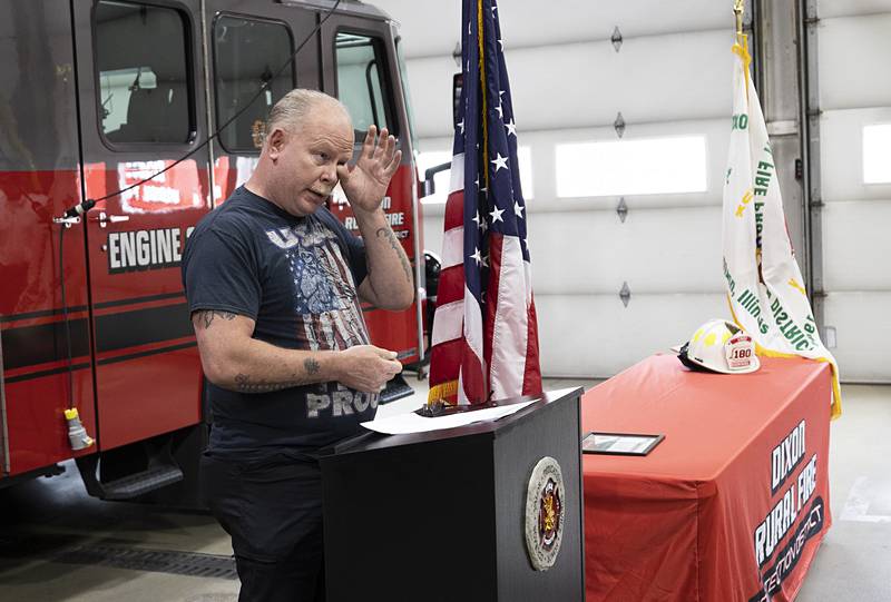 Robert Schiefelbein, 59, of Tampico takes the podium to thank Dixon Rural Fire Chief Dustin Dahlstrom for his quick actions on April 30.