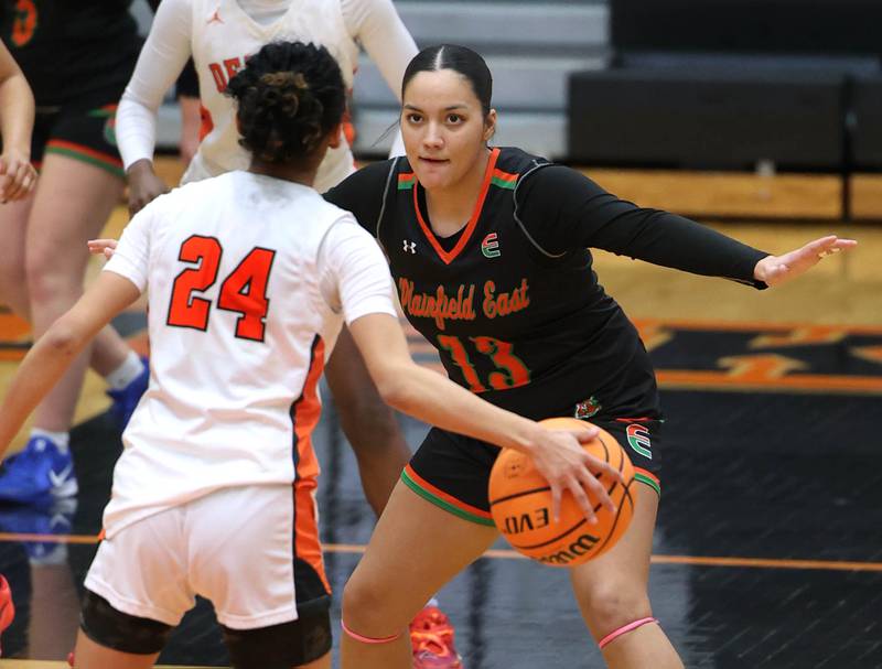 Plainfield East's Valeria Ramos plays defense against DeKalb's Nazeria Dean Thursday, Feb. 12, 2026, during their game at DeKalb High School.
