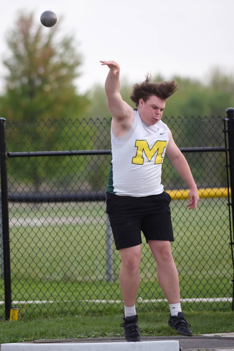 Bishop McNamara's Cale Hamilton throws the discus at the Herscher Invite Friday, May 2, 2025.