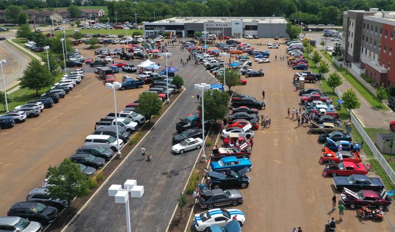 Many people attended the Cars and Coffee Car Show on Sunday,  July 14, 2024 at Bill Walsh Kia and Ford in Ottawa.