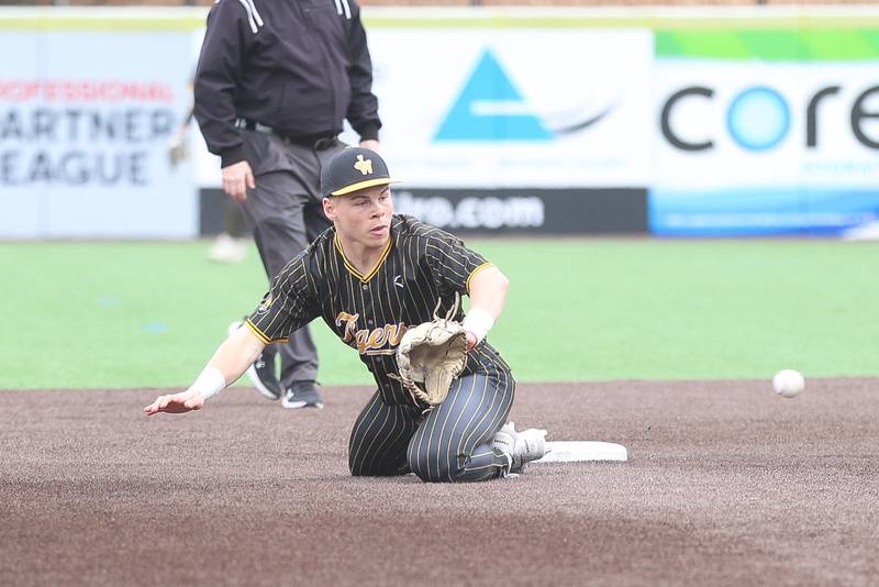 Joliet West’s Daniel Lukancic prevents damage by field the wide throw on a steal by Lockport in the WJOL Don Ladas Memorial baseball tournament championship game on Saturday, April 4, 2026 in Joliet.