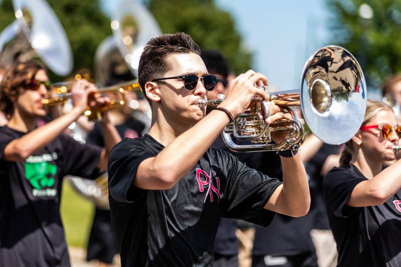 Evan McFarland, of the Plainfield North Marching Band, plays the mellophone in the Plainfield American Legion Marne Post 13 Memorial Day Parade on May, 26, 2025.
