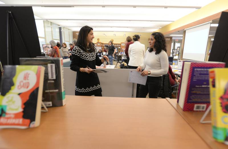Education Consultant Smita Garg of Chicago and Curriculum Coordinator Veena Rajashekar of Oak Park talk together during a breakout session while attending the Building Inclusive Community Conference held at Lyons Township Saturday, Feb. 8, 2025.