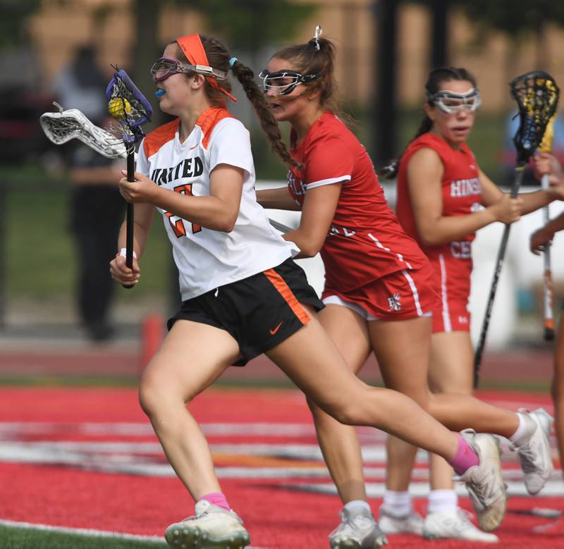 Crystal Lake Central Coop’s Anna Starr makes a move around the net to score during the third-place game of the girls lacrosse state finals at Hinsdale Central High School on Saturday, June 7, 2025.