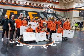 St. Charles East crowns 6 individual champions, holds off Glenbard West to take home regional title