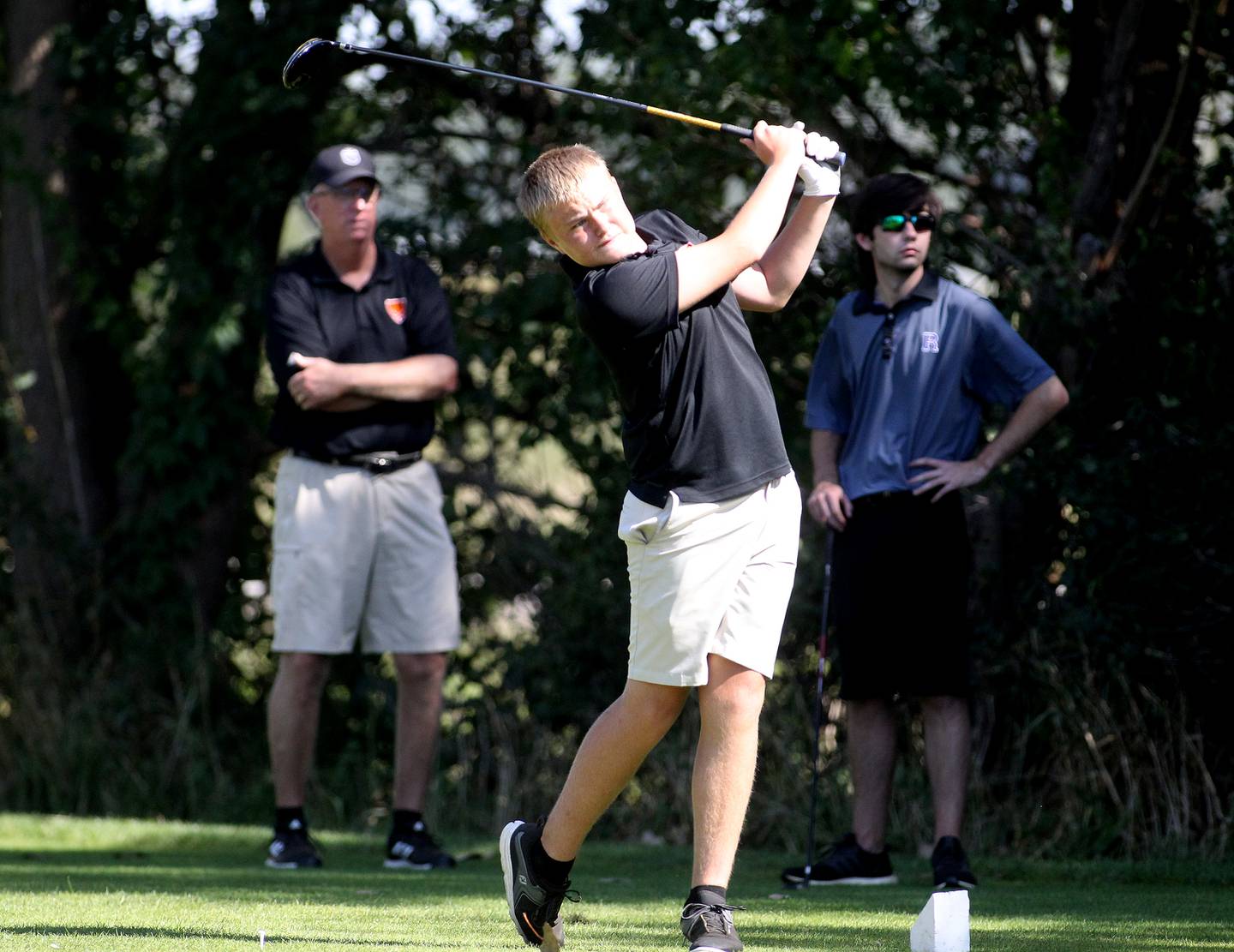 Sandwich's Noah Campbell tees off during the Interstate Eight Conference meet at Bliss Creek Golf Course in Sugar Grove last season.