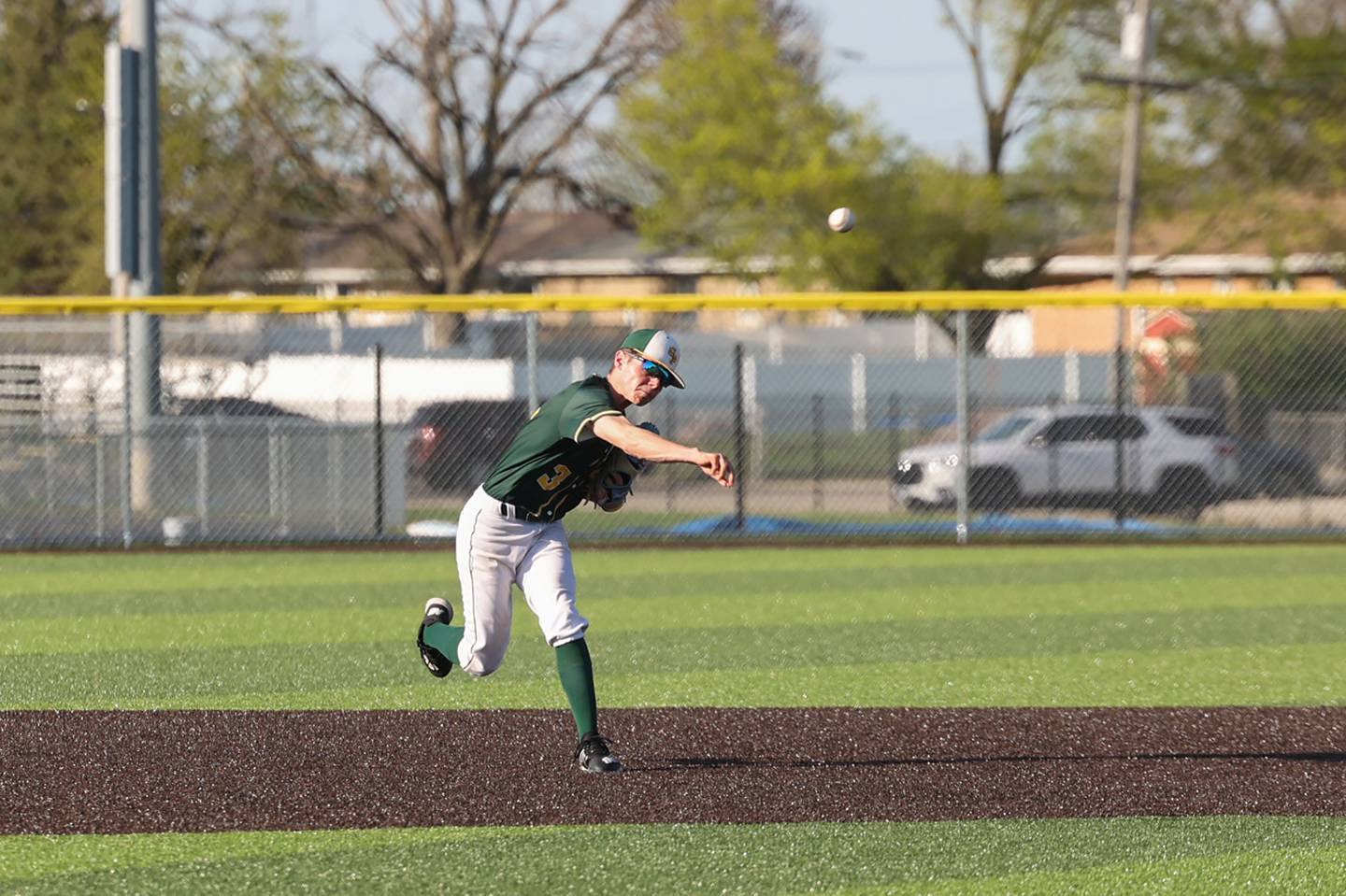 Grant Park's Nolan Olthoff throws to first base during the Dragons' 21-0 loss to Herscher on Wednesday, April 23, 2025.